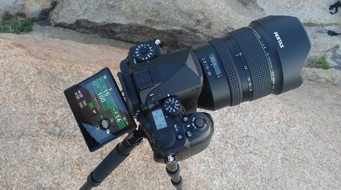 Pentax K-1 Mark II and 15-30mm f/2.8 with the rear LCD tilted out.